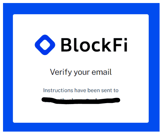 The Blockfi verification of email is displayed on the photo.